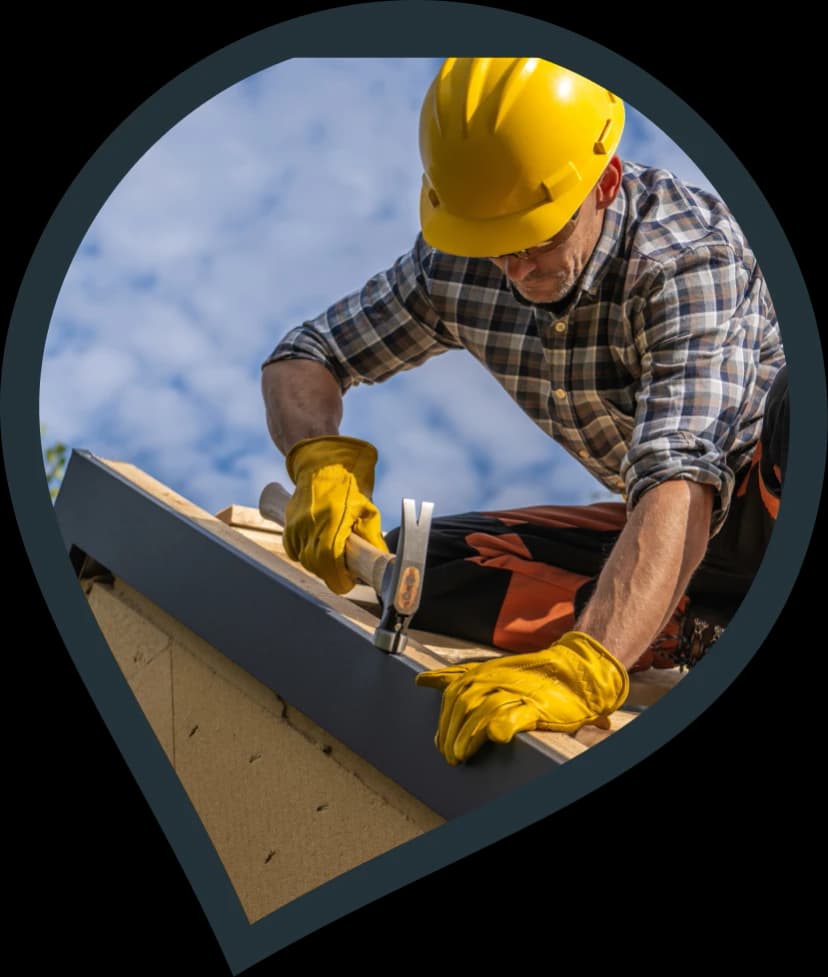 two roofers installing slate tiles onto a brand new roof URL