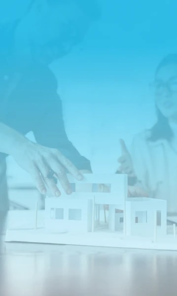 Two residential architects adjusting and conversing over a conceptual design