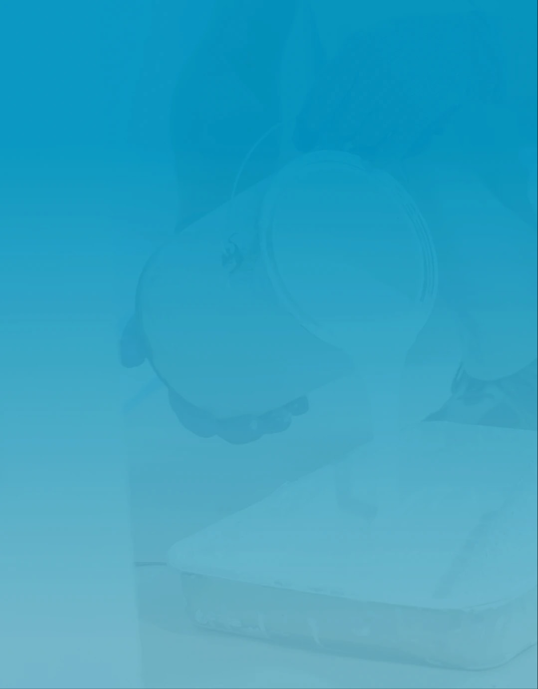 Painter pouring paint into a paint tray with clips roller